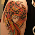 phoenix tattoos - phoenix arm tattoo