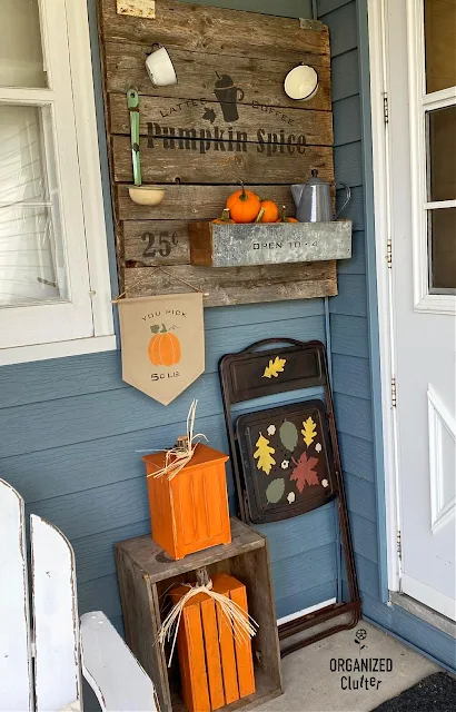 Photo of rustic fall decor on the covered patio.