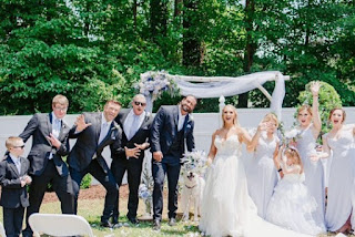 Thom Latimer with his wife Kailey Dawn in their wedding dress with freinds & family