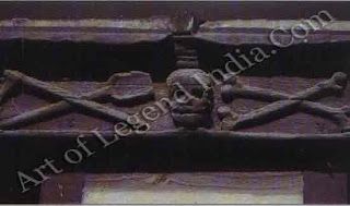 Symbols of death, Plague victims were often buried in mass graves outside towns. This macabre carving of a skull, crossbones and grave-diggers tools marks the site of a plague cemetery in Rouen, France - the result of an outbreak in 1521. 