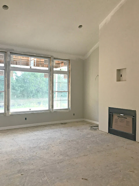 tall fireplace family room 