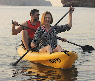 John Farmanesh-Bocca enjoying rafting with his wife Brenda