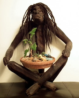 Primitive men in yoga position with Shrubland Rose