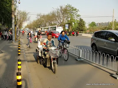 mixture of vehicles in traffic in Beijing