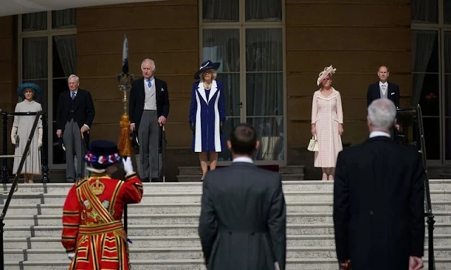 The  Duke and Duchess of Edinburgh, the Duke and Duchess of Gloucester. The Duchess wore a pink outfit by Suzannah