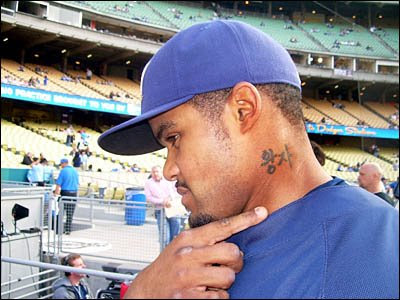  Korean Heritage night at Dodger Stadium, I noticed an interesting tattoo 