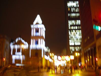 Christmas lights on Carrera Septima in Bogotá - a bit blurry like our memory