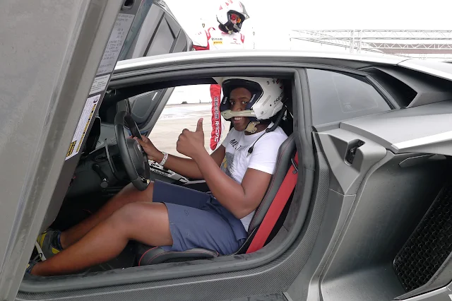 A very happy Lwanda in the Lamborghini Aventador SV in Las Vegas, Nevada