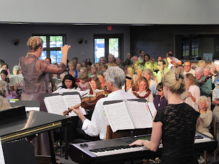 Angie Carr on keyboard,Don Lax 1st violin and Celia Canty conductor