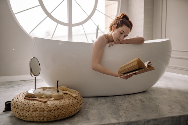 A lady relaxing and reading