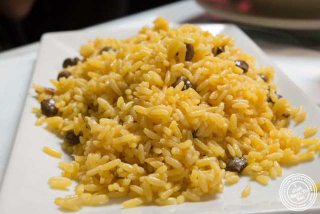 image of yellow rice and pigeon peas at La Isla in Hoboken, NJ