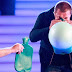 Real-Life Superhuman Blows Up Hot Water Bottles with His Nose