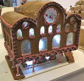 Pic of elaborate Gingerbread station with large windows and pillars