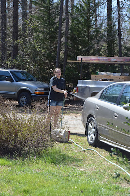 Sarah washing the car