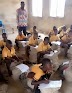 Nigerians Reacts To Photo Of An Npower Teacher & His Pupils Learning In A Bad Condition