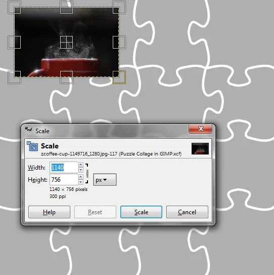Resize and reposition using the Move Tool and the Scale Tool.
