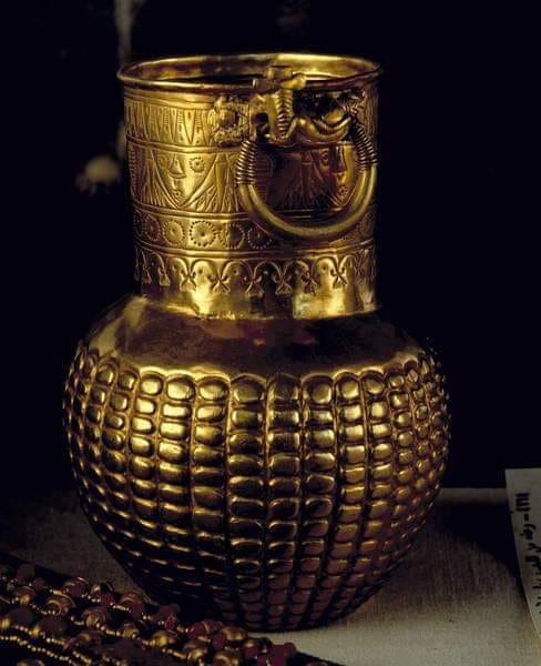 This is an ancient Egyptian (golden vase) in the form of pomegranate!