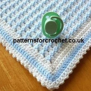 http://www.craftsy.com/pattern/crocheting/home-decor/pfc50-crib-blanket-baby-crochet-pattern/123831?SSAID=924082