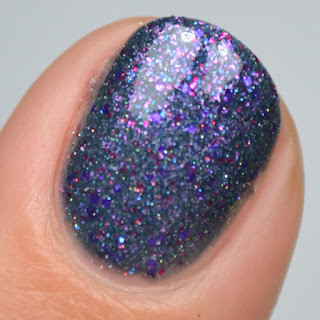 teal nail polish with glitter