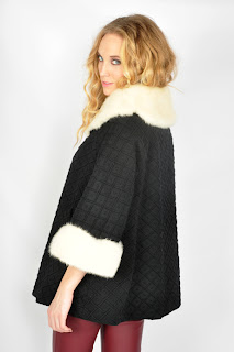 Vintage 1960's black wool swing coat with white mink collar and cuffs.