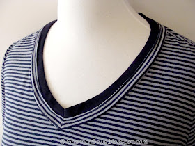 fix a low neckline on a t-shirt by adding knit binding