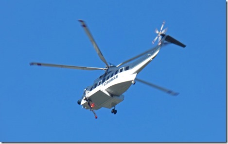 Lobster Creek Fire -- helicopter headed to fire over Huntley Park near Gold Beach