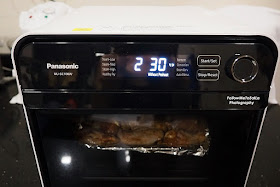 Roast the chicken wings on Convection with Preheat at 230oC for 20 – 30 minutes