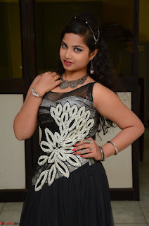 Shrisha Dasari in Sleeveless Short Black Dress At Follow Follow U Audio Launch 053.JPG
