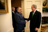 President George W. Bush welcomes Vice President Adil Abd Al-Mahdi of Iraq to the Oval Office Thursday, March 15, 2007. White House photo by Eric Draper.