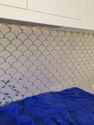 Herringbone tiles kitchen splashback