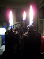 hoodoo breakup candles burning