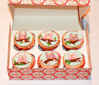 Box of apple and cinnamon cupcakes with cute owl toppers