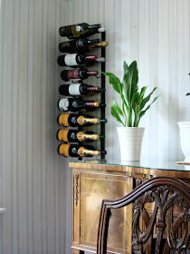 wall wine rack designed so you can read the labels