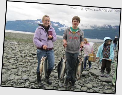 Young people with their salmon catches in Valdez, AK.