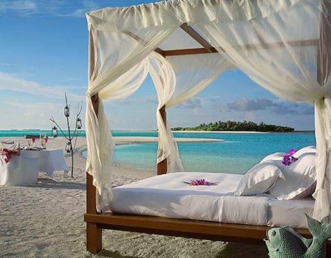 bed on beach, paradise