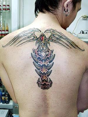  and is filed under back piece tattoos biomechanical tattoo 