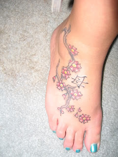 Feminine Japanese Tattoos With Image Japanese Cherry Blossom Tattoo Designs Especially Japanese Cherry Blossom Foot Tattoo Gallery Picture 4