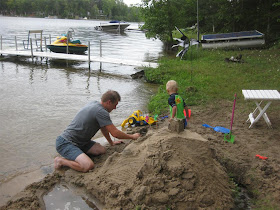 building sandcastles, on the beach, moatsandcastles