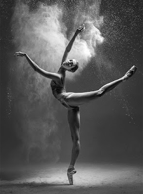 Ballerina dancing with flour