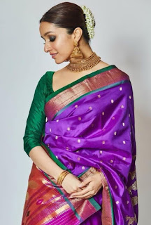 Green blouse paired with purple saree