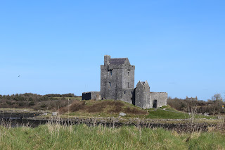 castle on a hill set against a blue sky