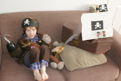  is the finished pirate ship with Joey dressed in his pirate outfit