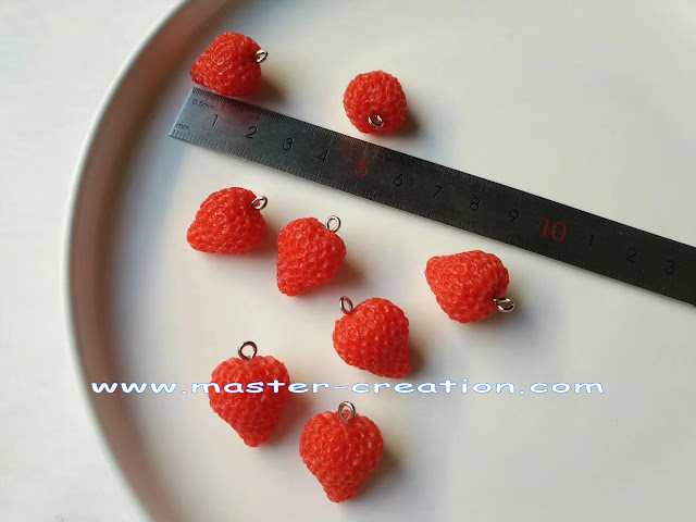 simulated strawberry pendant