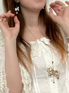 detail: necklace and earrings