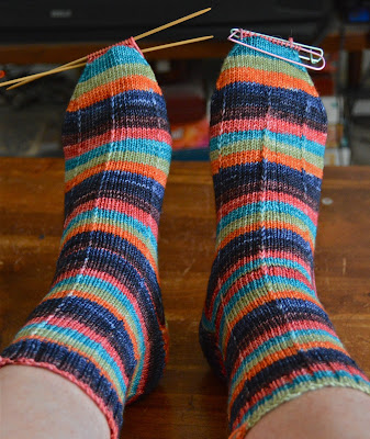 hand knit socks with a slip stitch pattern