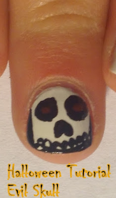 http://apolishedbookworm.blogspot.com/2015/10/halloween-tutorial-evil-skull-nail-art.html