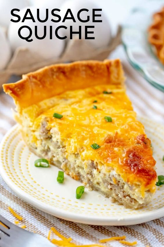 If you are a breakfast or brunch person then you'll want this easy cheesy Sausage Quiche on your menu. Minimal ingredients create this delicious flavorful dish. #breakfast #brunch #eggs #sausage #easyrecipe #bake