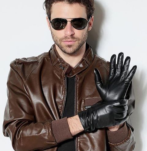 Brown leather jacket, sunglasses, black leather gloves dude