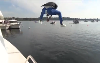 Robert Griffin III splits pants while jumping into lake, 9/2/2023