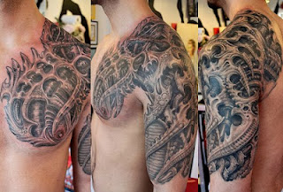3d tattoo on the chest, shoulder and arm